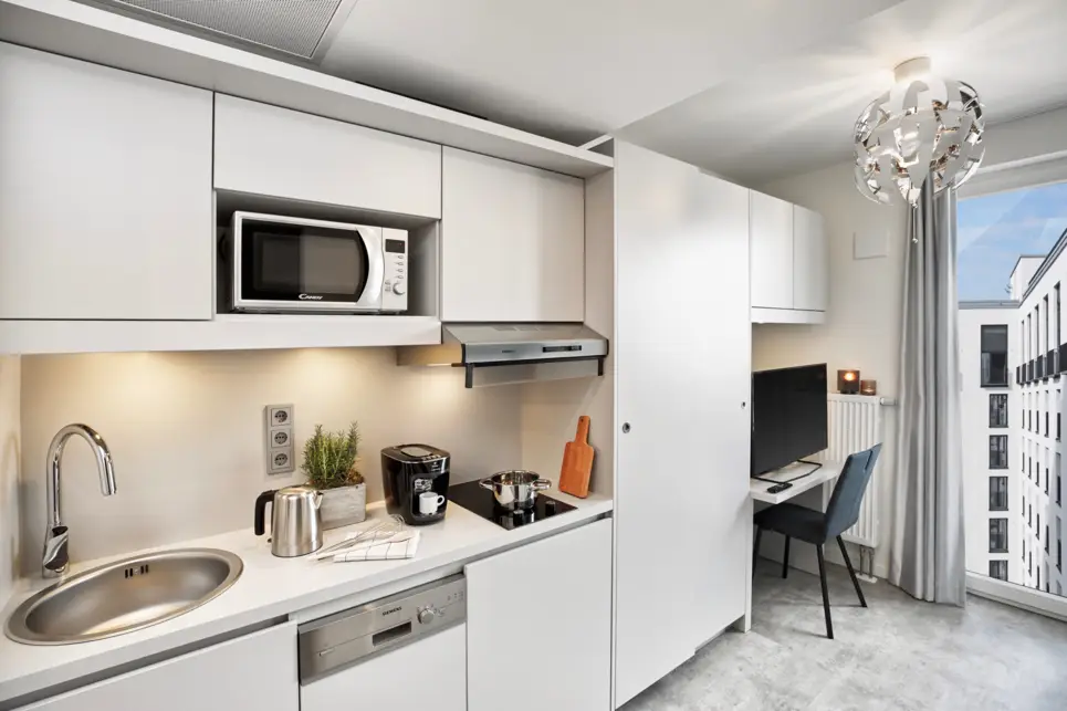 Küche im Komfort Studio - H.ome Serviced Apartments München - Offizielle Webseite