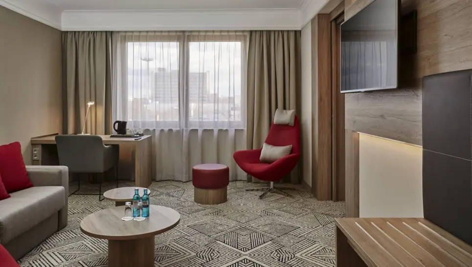 A spacious hotel room at the H4 Hotel Hannover Messe - Official website