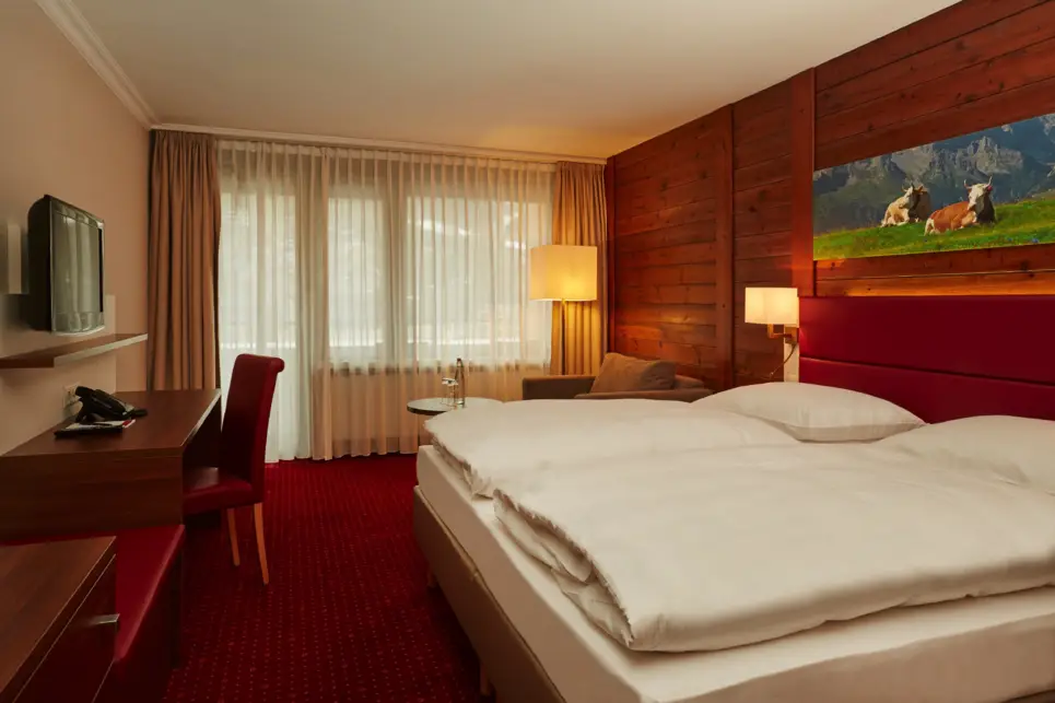 Gemütliches Superior Doppelzimmer im H+ Hotel & Spa Engelberg - Offizielle Webseite