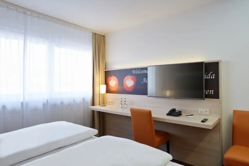 Modernes Komfort Doppelzimmer im H+ Hotel Stuttgart Herrenberg - Offizielle Webseite